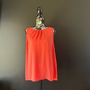 Peach pull over sleeveless blouse